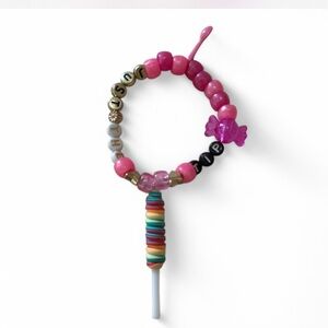 Pink Beaded Rave Kandi Bracelet with lollipop bead